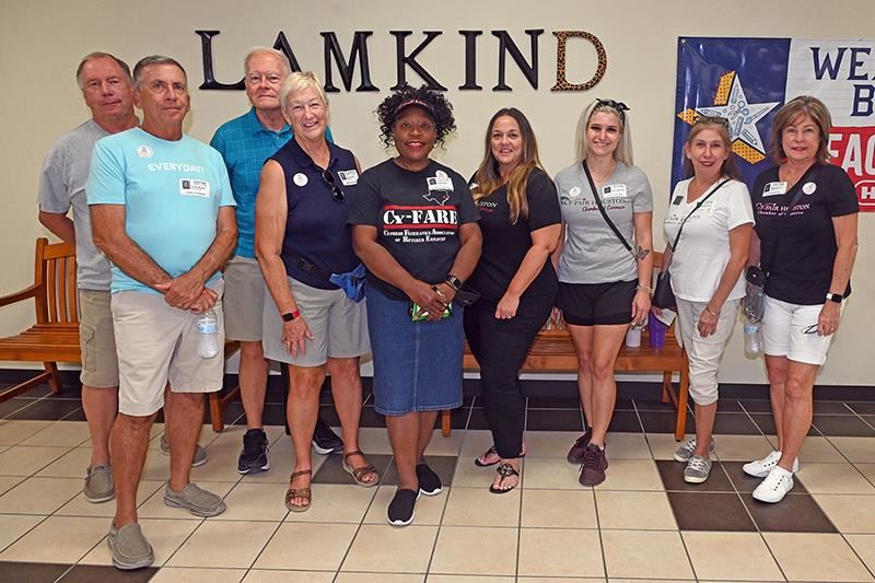 Representatives from the Cy-Fair Chamber of Commerce join other volunteers as Bus Buddies at Lamkin Elementary School.